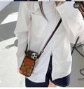 Effortless Elegance: The Monogram Crossbody Envelope Case