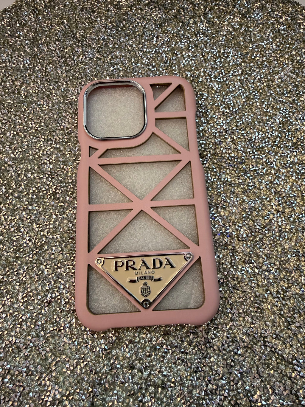 The Geometric Prada Cage Case in Blush Pink.