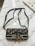 Iconic Oblique Embroidered Crossbody Bag in Navy & Cream